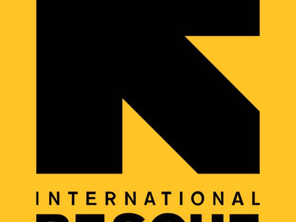 International Rescue Committee logo featuring a yellow background with a black arrow and the text 'IRC' in bold.