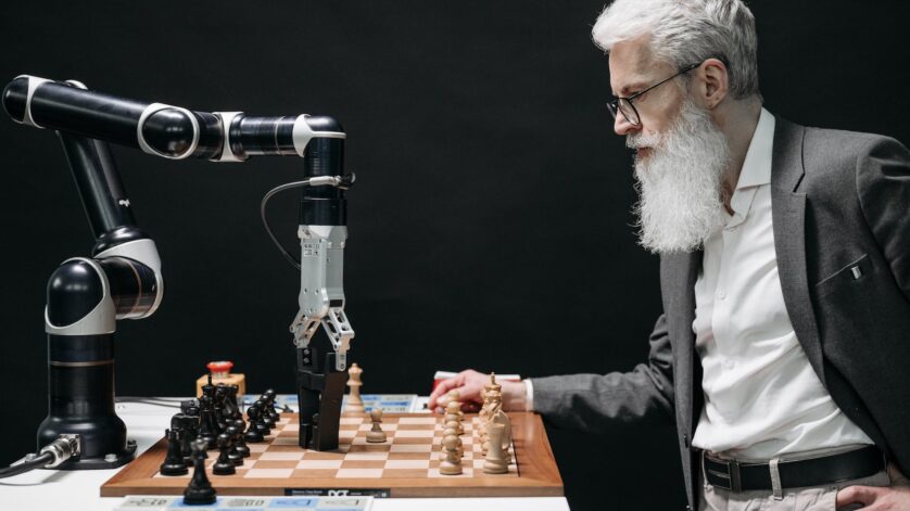 a bearded man playing chess